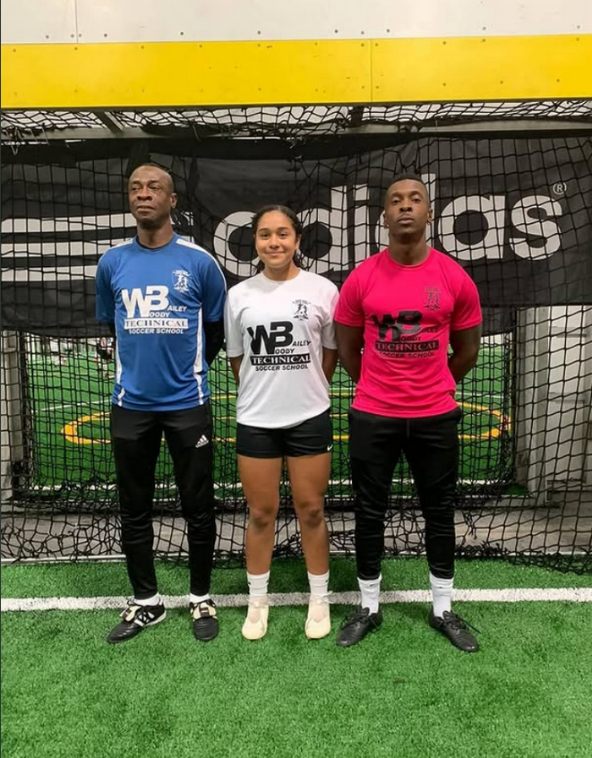Olivia Smith with Woody Bailey Soccer School ownership and coaching team
